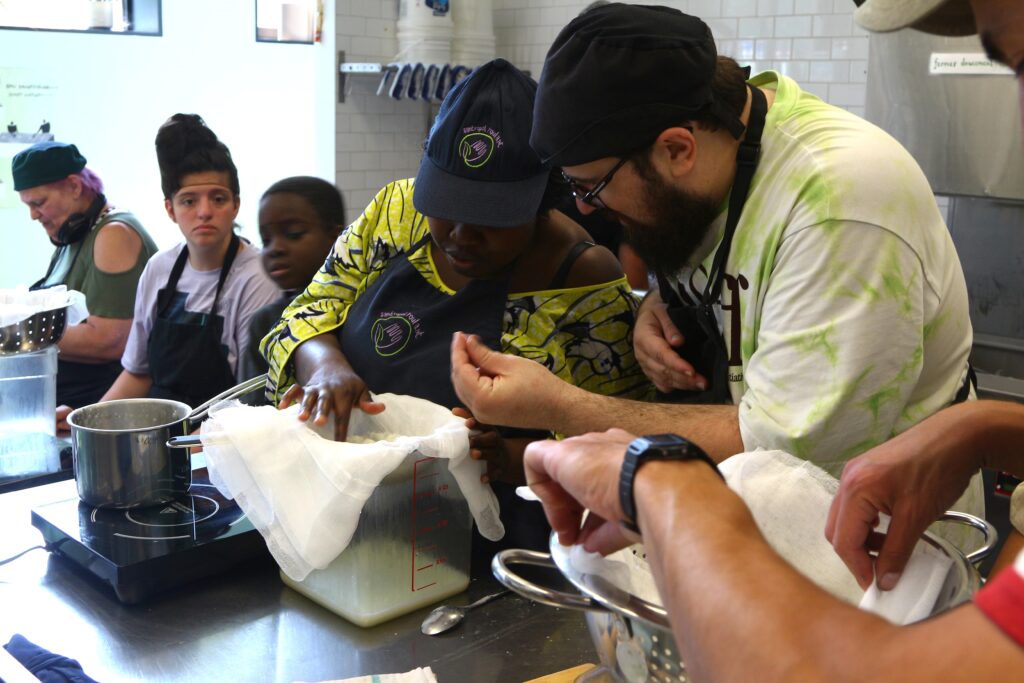 Group of people learning how to bake